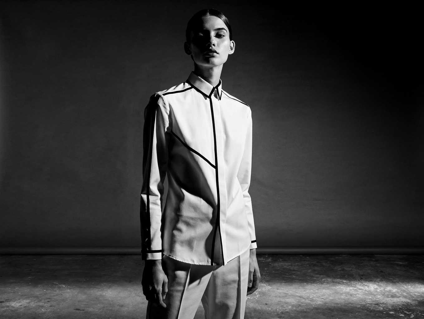 Sarah in a minimalist studio setting